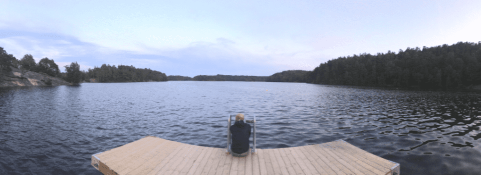 Peaceful lakeside view reflecting the trust in Sweden